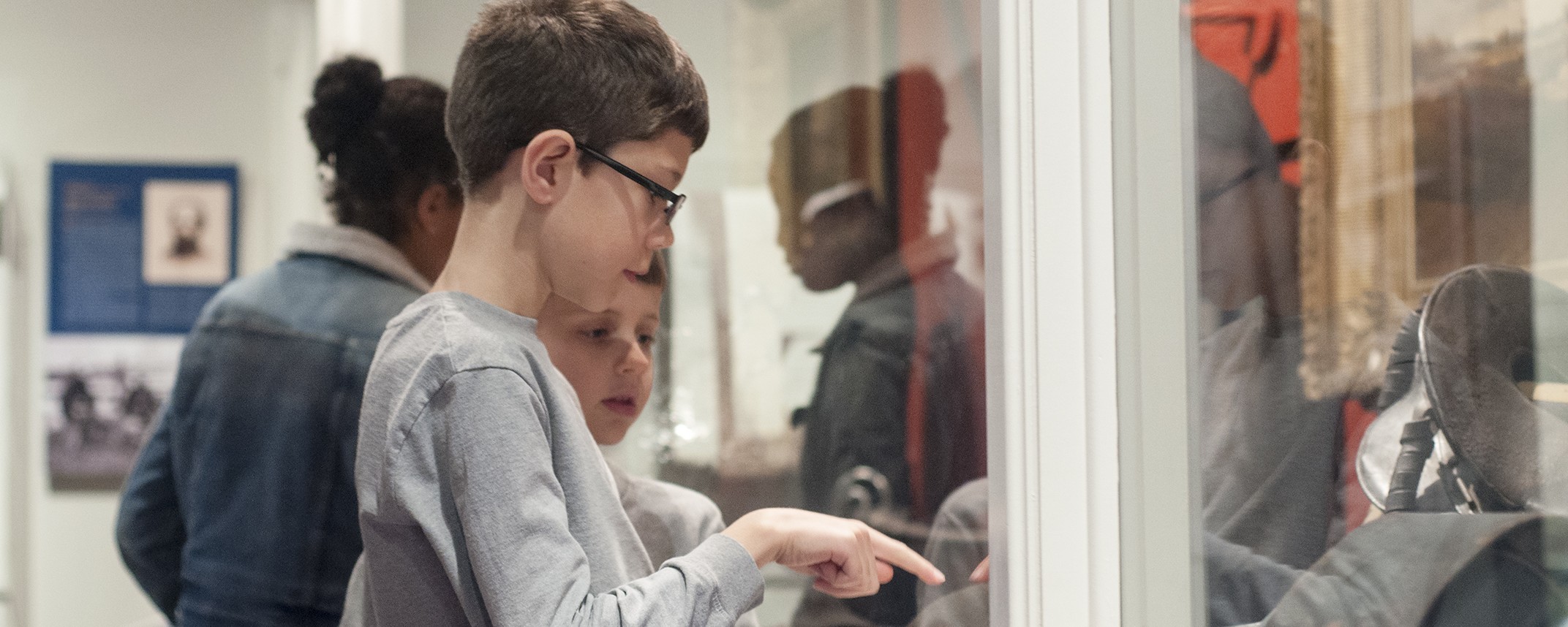 children looking at exhibit
