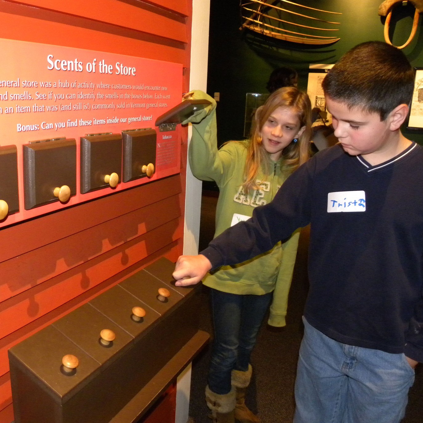 Children looking at museum exhibit