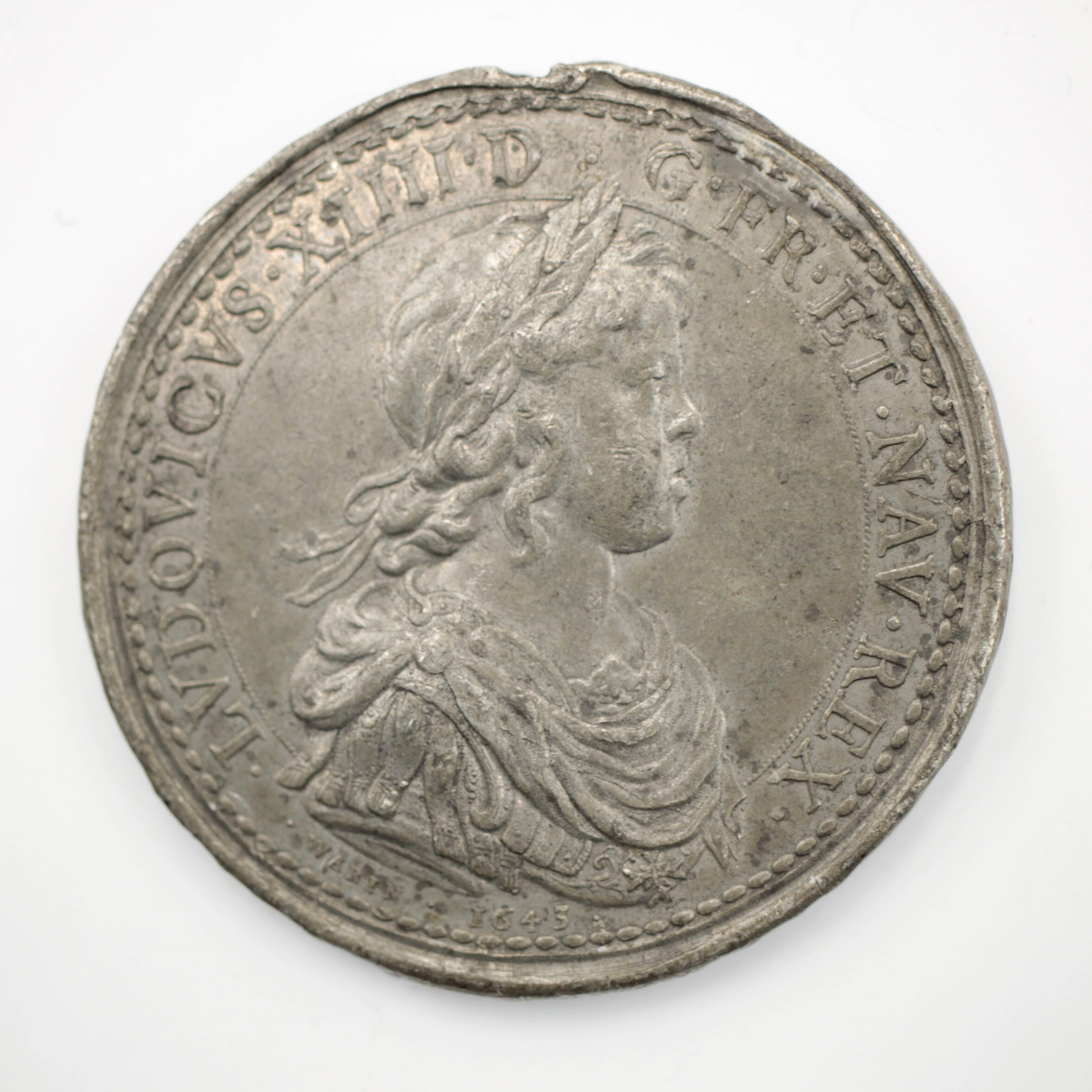 medal featuring profile of King Louis XIV