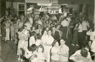 old photo of people at community dance